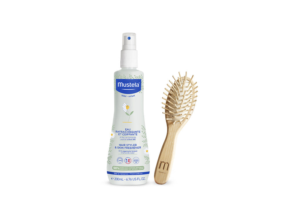 mustela-set-acqua-rinfrescante-spazzola-ovale-capelli-in-legno image 1